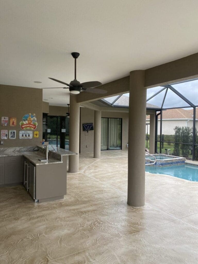 A large open kitchen with an outdoor pool.